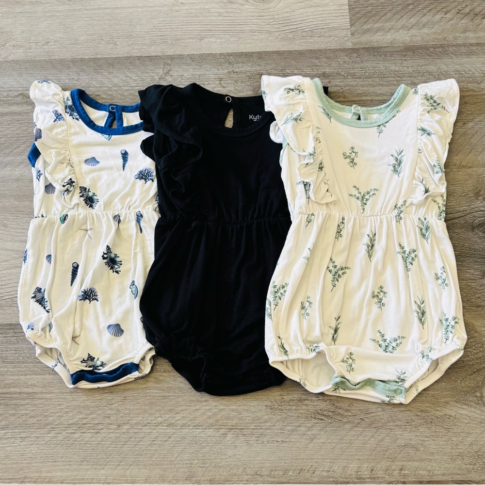 Kyte Baby 6-12 months Girls 3-Pack Ruffle Rompers Set Black, White & Floral